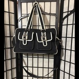OiOi-Australia Baby Bag in Black with White Trim Vegan Leather.